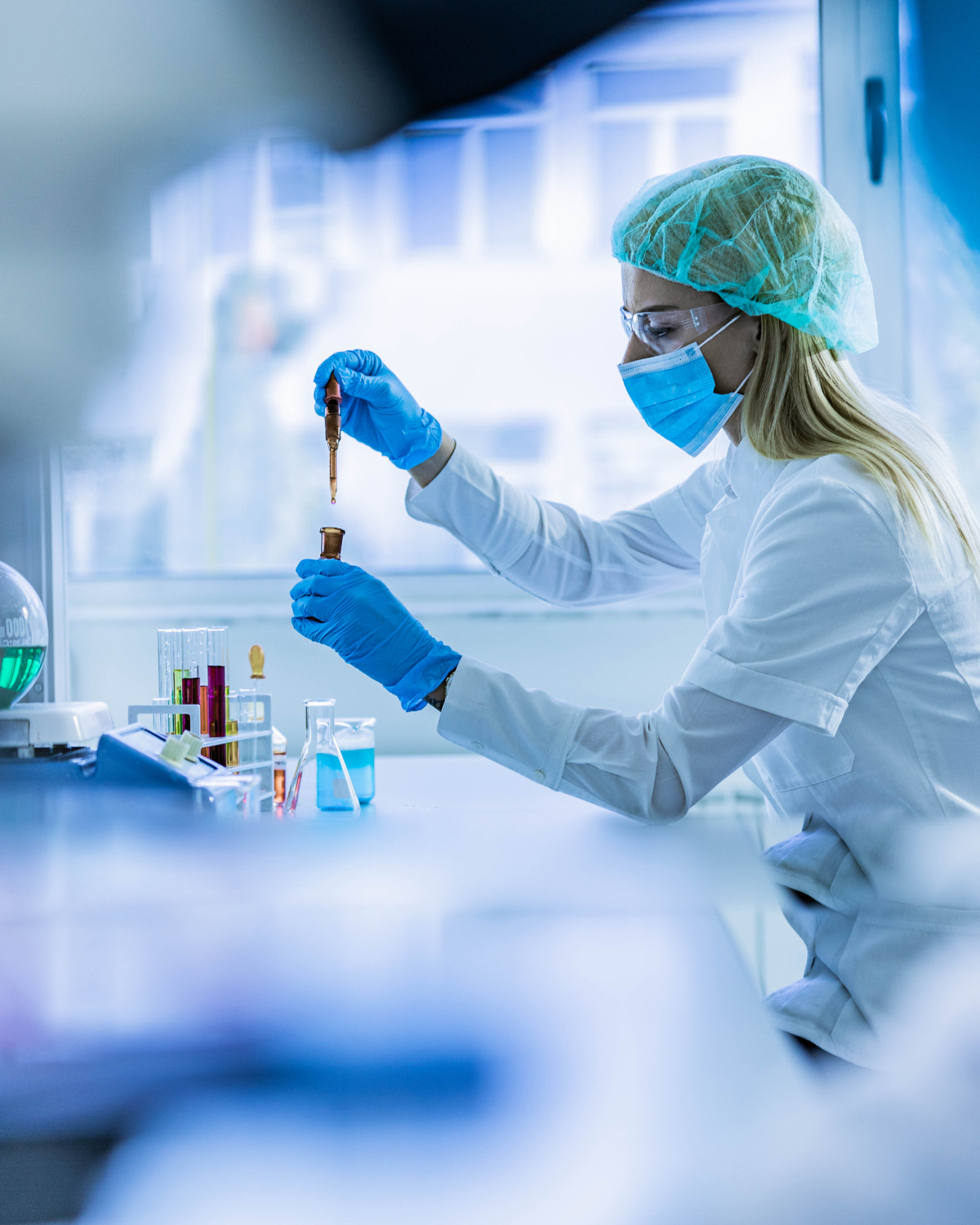 Lab technician at Sontag Foundation conducting an experiment in the laboratory