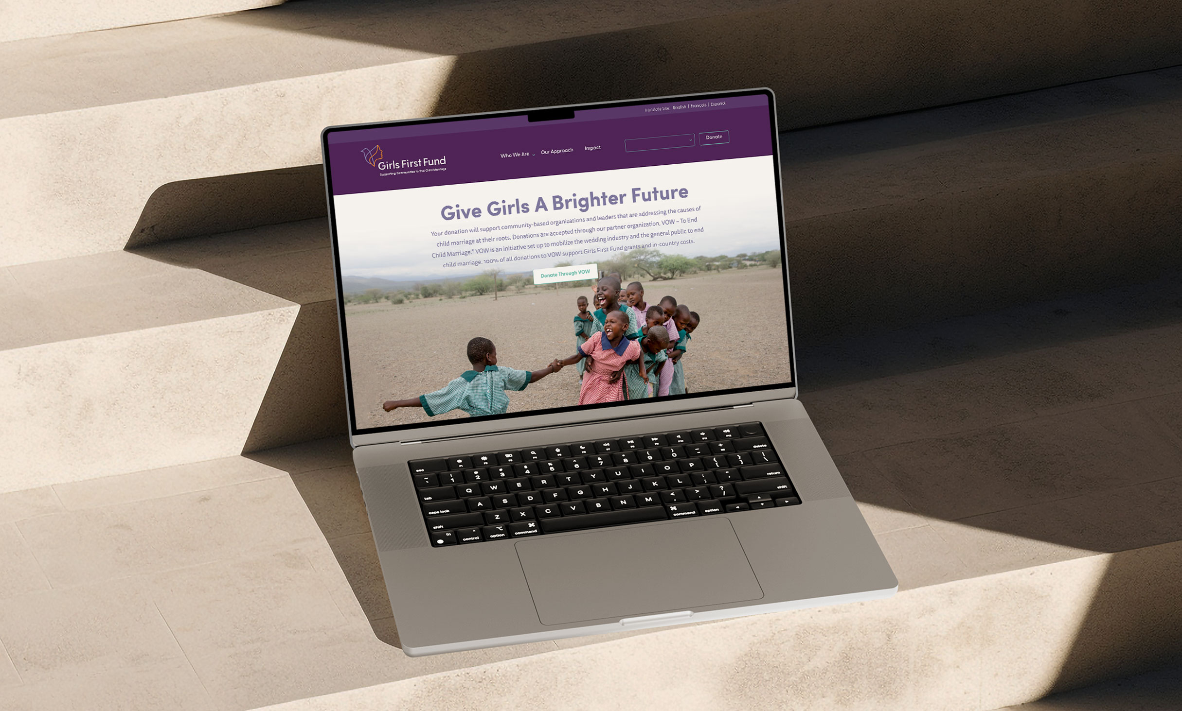 Girls First Fund nonprofit web design - donation page in a laptop mockup