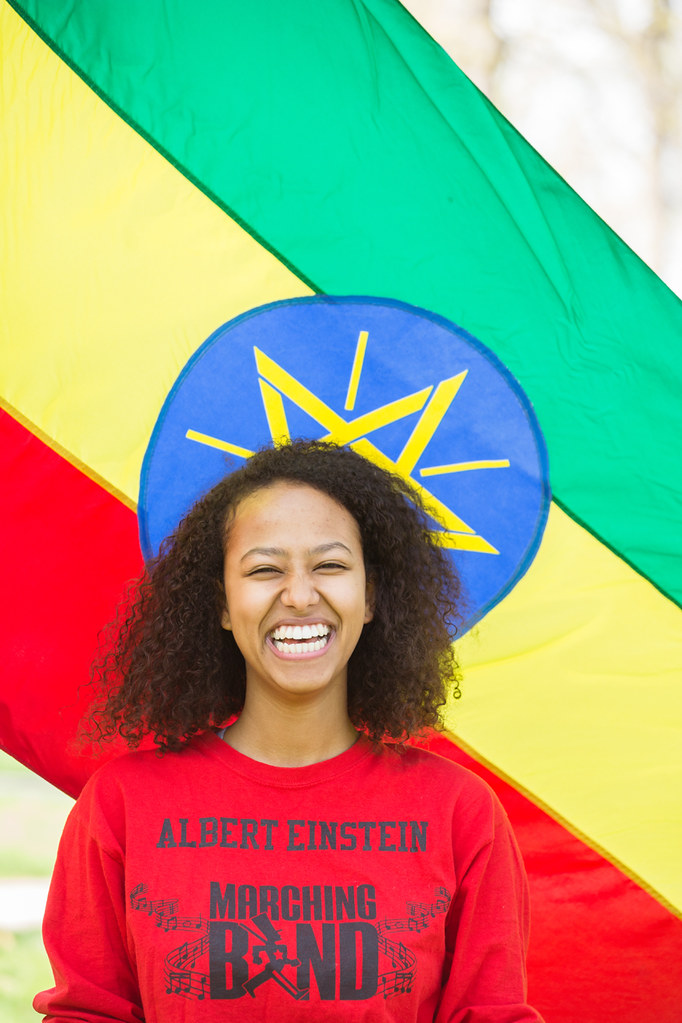 International student at Lehigh university with flag