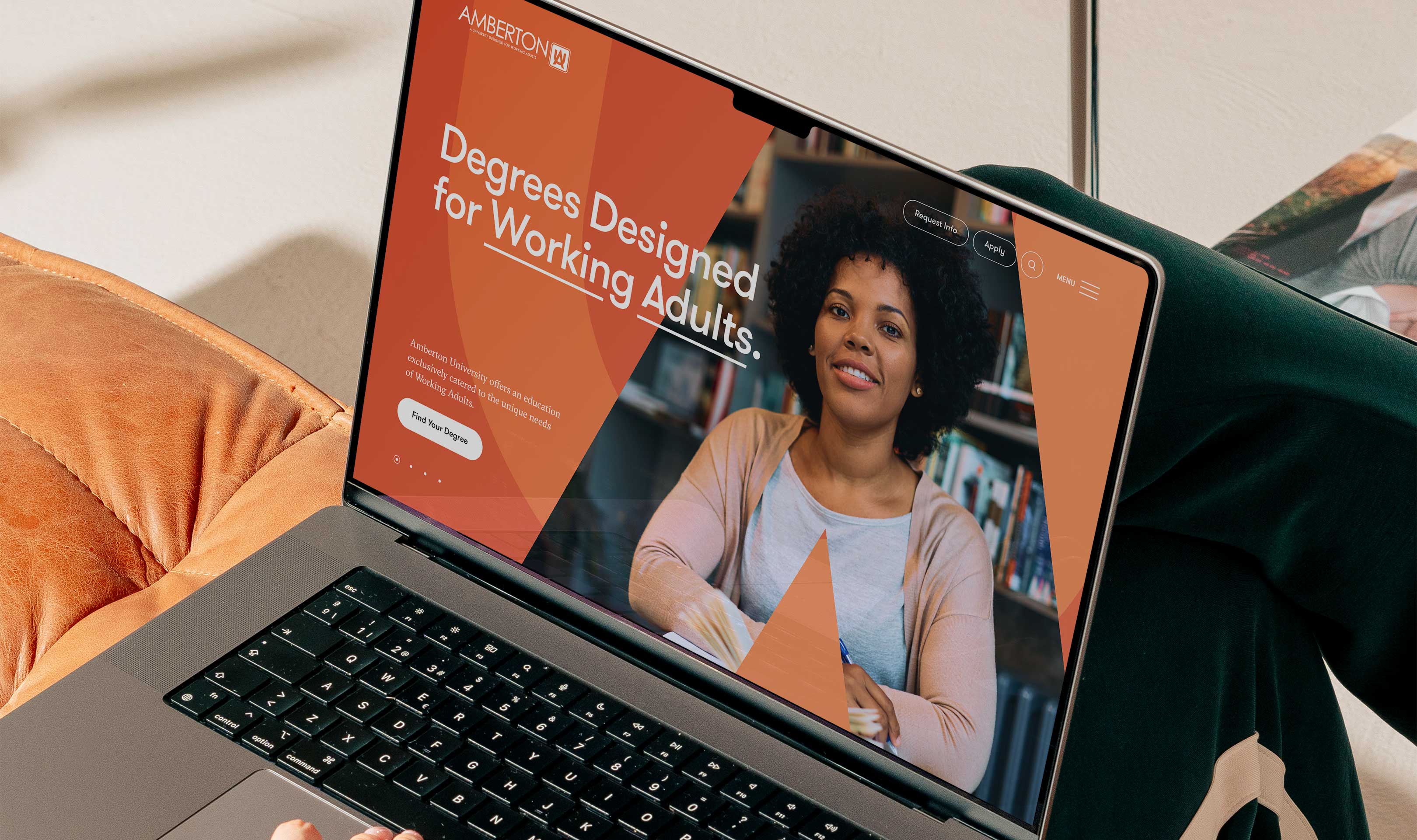 Amberton University education web design homepage in a lifestyle mockup