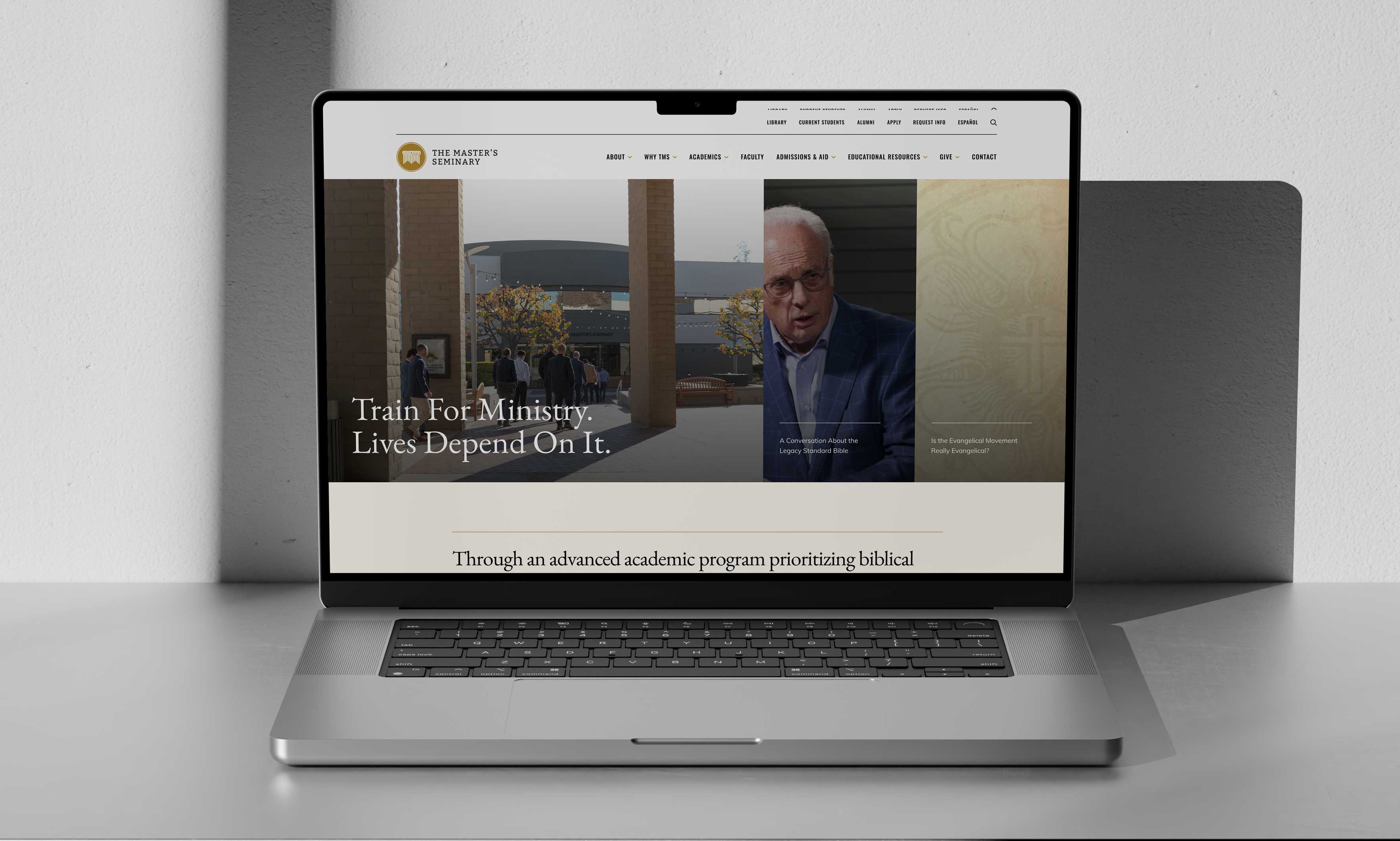 TMS responsive website design homepage in a laptop mockup