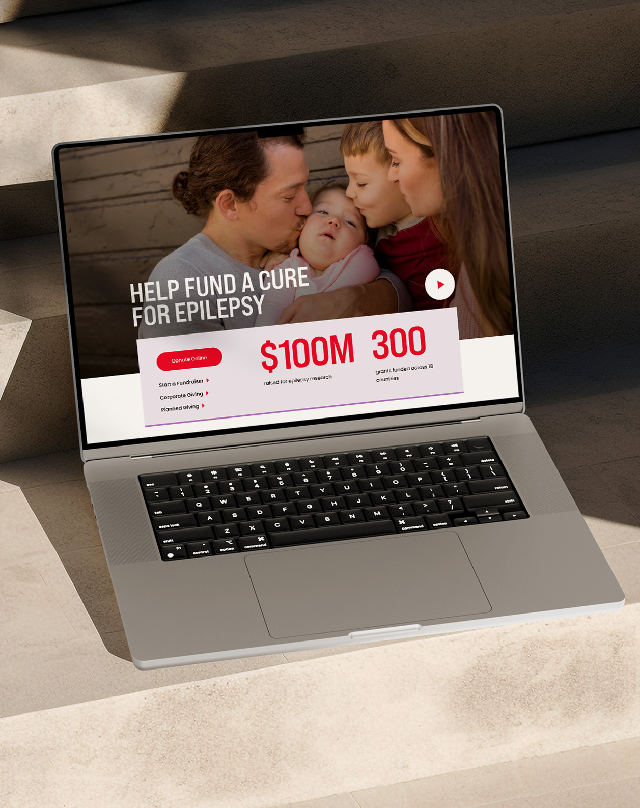 Cure Epilepsy responsive website design page in a laptop mockup