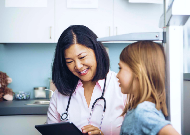 Brand imagery of doctor and child in a healthcare setting for United Healthcare Children’s Foundation